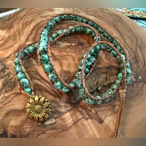 Beaded Wrap Bracelet with Gold Flower Clasp